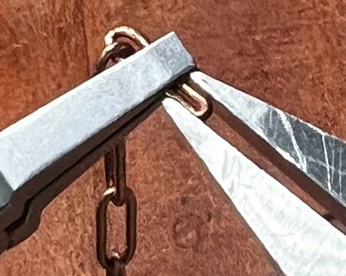 Susan LeGuyader's Altering an Existing Chain - From Paperclip to Petal Links - , Contemporary Wire Jewelry, Making Chain, Chain Making , Design, I held a link in flat nose pliers